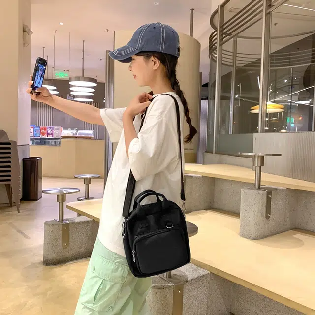 醇龙  尼龙女生多色透明斜挎单肩包外出简约休闲背包