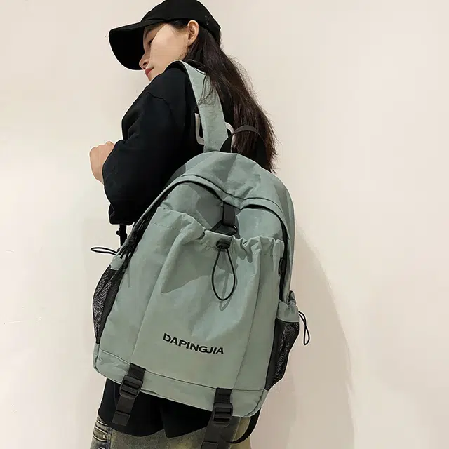 醇龙 户外运动轻便休闲防泼水 尼龙布 双肩包 男女同款情侣款 棕/浅灰/黑/绿