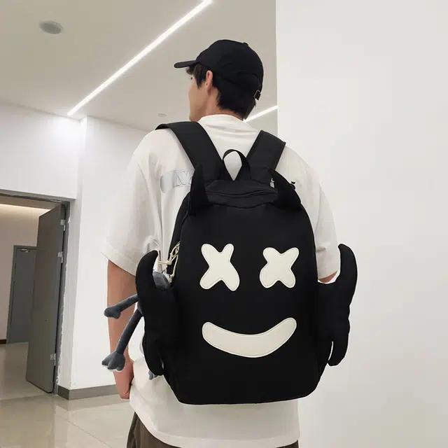 醇龙 可爱搞怪笑脸设计感小众大容量休闲旅行 尼龙 双肩包 常规 男女同款情侣款 黑/白