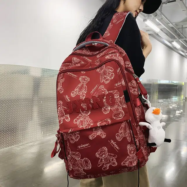 醇龙  尼龙男女通用多色大容量双肩包