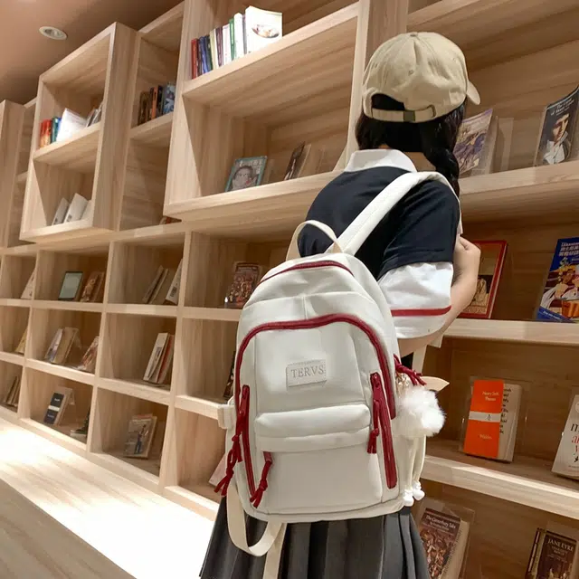醇龙  尼龙男女通用多色书包大容量学生轻便减负护脊高颜值背包纯色多口袋双肩包
