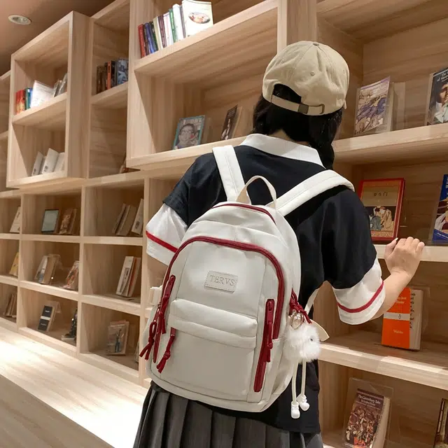 醇龙  尼龙男女通用多色书包大容量学生轻便减负护脊高颜值背包纯色多口袋双肩包
