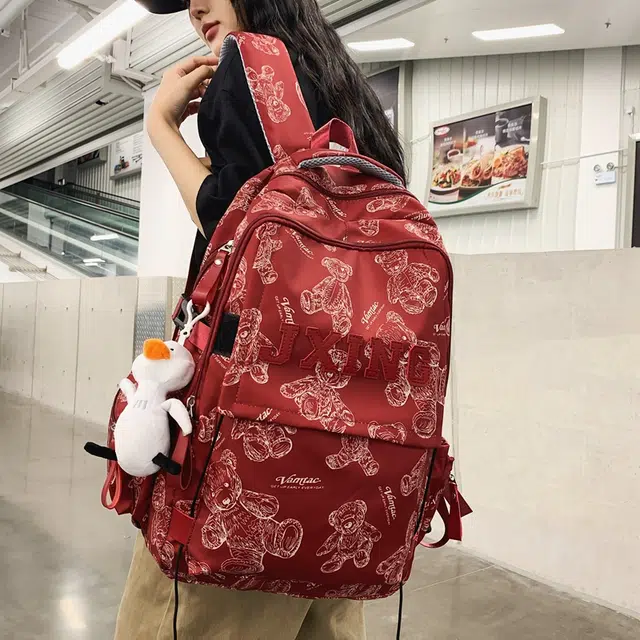 醇龙  尼龙男女通用多色大容量双肩包