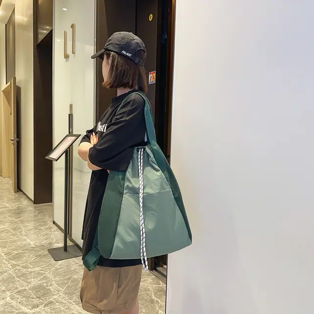 醇龙 抽绳运动防水通勤大容量手提多功能 尼龙 双肩包 男女同款情侣款 多色