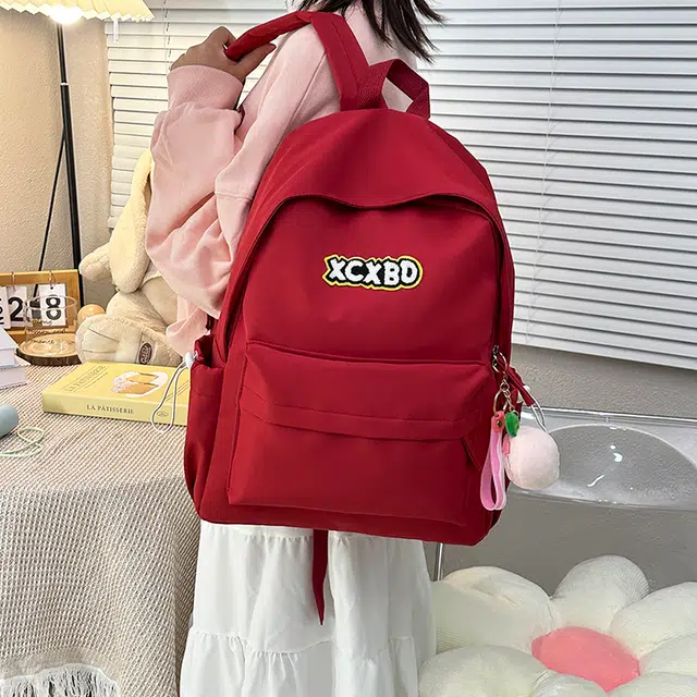 醇龙  尼龙男女通用多色书包学生韩版纯色大容量耐磨双肩包旅行背包