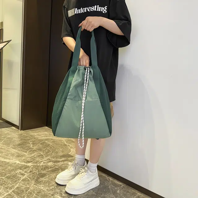 醇龙 抽绳运动防水通勤大容量手提多功能 尼龙 双肩包 男女同款情侣款 多色
