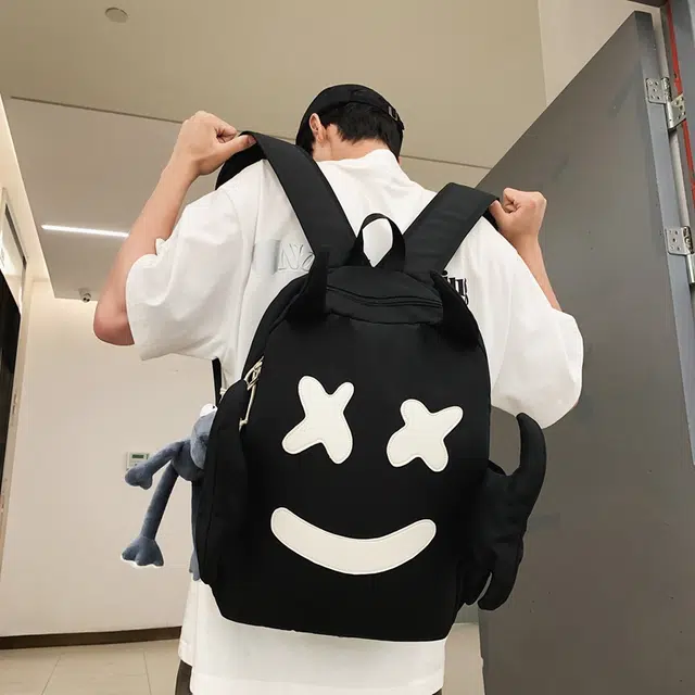 醇龙 可爱搞怪笑脸设计感小众大容量休闲旅行 尼龙 双肩包 常规 男女同款情侣款 黑/白