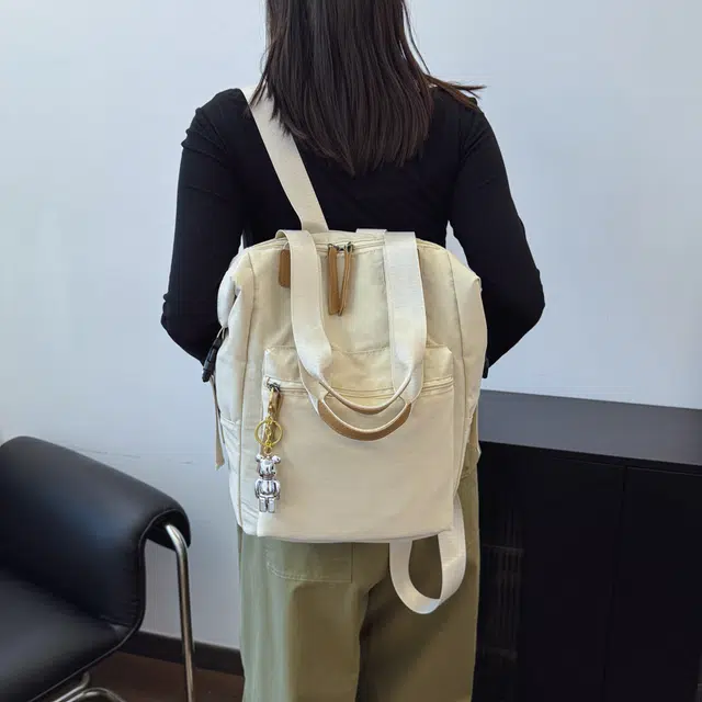 雅鹿 日系纯色极简风无印通勤休闲多功能轻便外出旅游 帆布 双肩包 常规 男女同款情侣款 多色