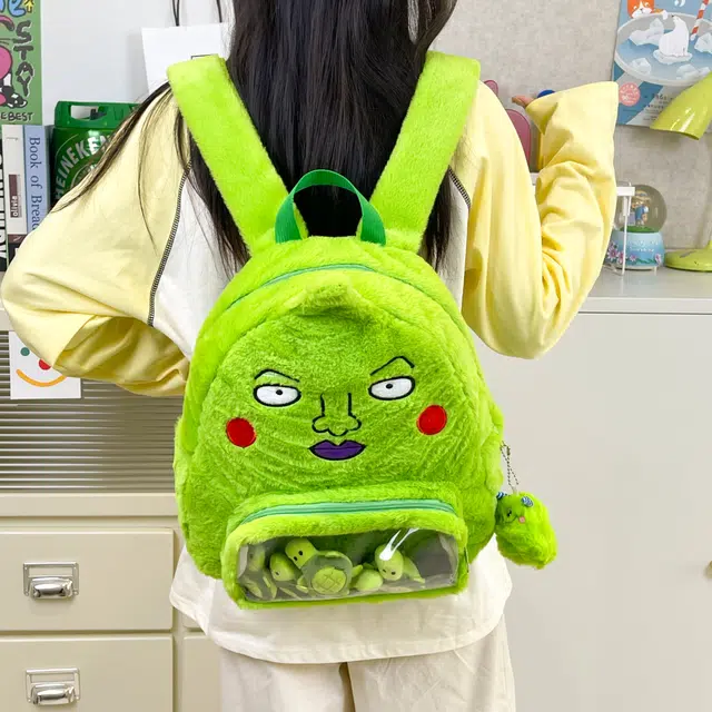 雅鹿 日韩通勤搞怪系百搭丑萌表情学生上课校园风透明层抽象百搭背包 毛绒 双肩包 男女同款情侣款 绿色