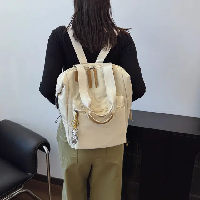 雅鹿 日系纯色极简风无印通勤休闲多功能轻便外出旅游 帆布 双肩包 常规 男女同款情侣款 多色