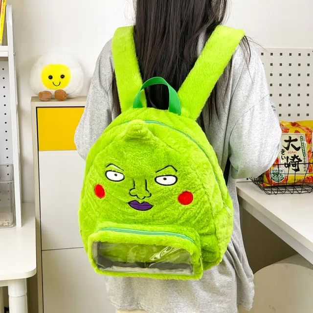 雅鹿 日韩通勤搞怪系百搭丑萌表情学生上课校园风透明层抽象百搭背包 毛绒 双肩包 男女同款情侣款 绿色