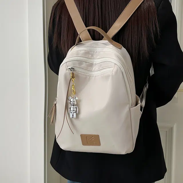 雅鹿 春夏日韩系简约大容量学院风学生上课书包通勤短途旅行 尼龙 背包双肩包 男女同款情侣款 黑灰色/白色/卡其色