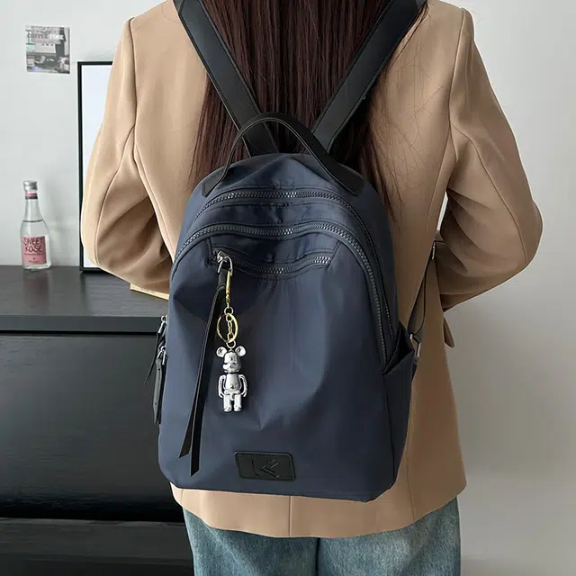 雅鹿 春夏日韩系简约大容量学院风学生上课书包通勤短途旅行 尼龙 背包双肩包 男女同款情侣款 黑灰色/白色/卡其色