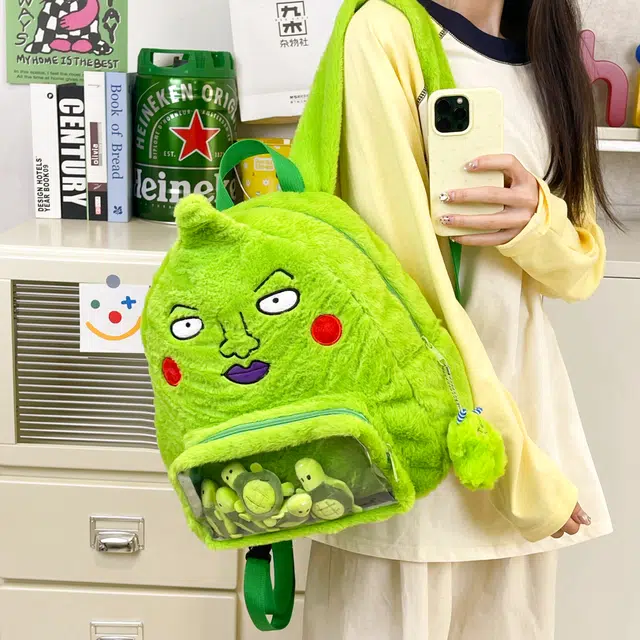 雅鹿 日韩通勤搞怪系百搭丑萌表情学生上课校园风透明层抽象百搭背包 毛绒 双肩包 男女同款情侣款 绿色
