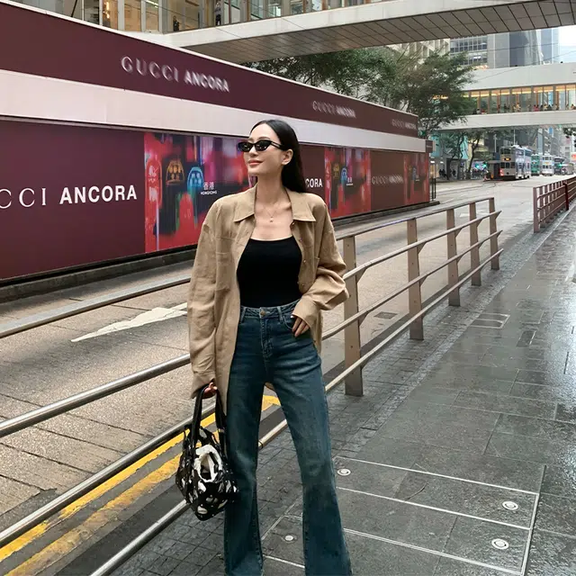 周淼 纯色纽扣长袖衬衫 女款