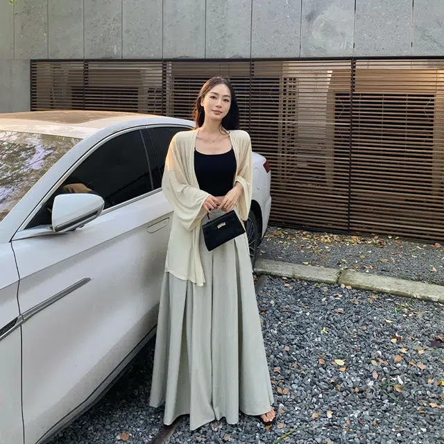 周淼 通勤简约纯色圆领中长款长袖针织衫 女款