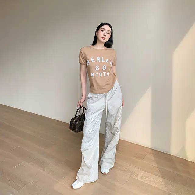 周淼 假口袋收褶通勤中腰薄款直筒休闲裤 女款
