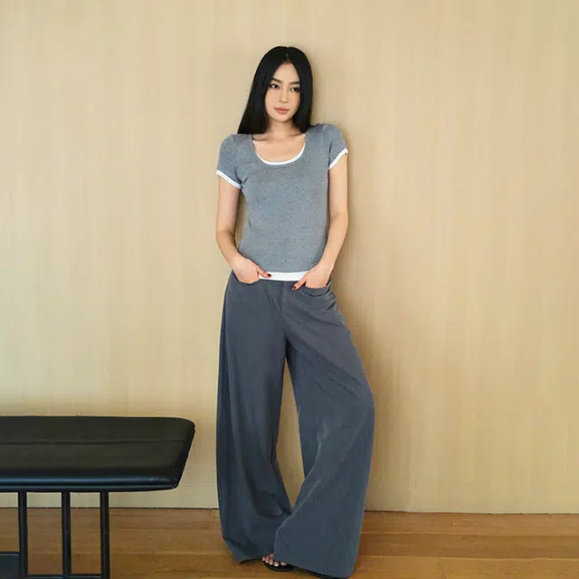 周淼 纯色前片斜向分割宽松阔腿西装休闲裤 女款