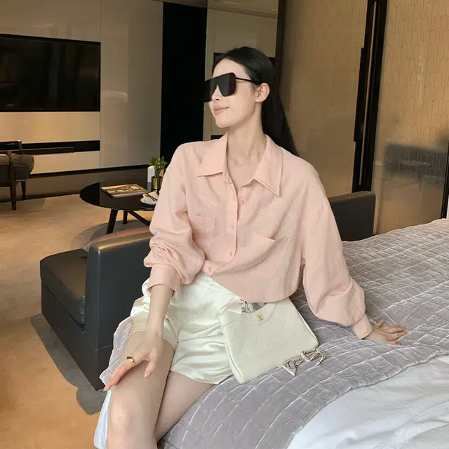 周淼 纯色纽扣长袖衬衫 女款