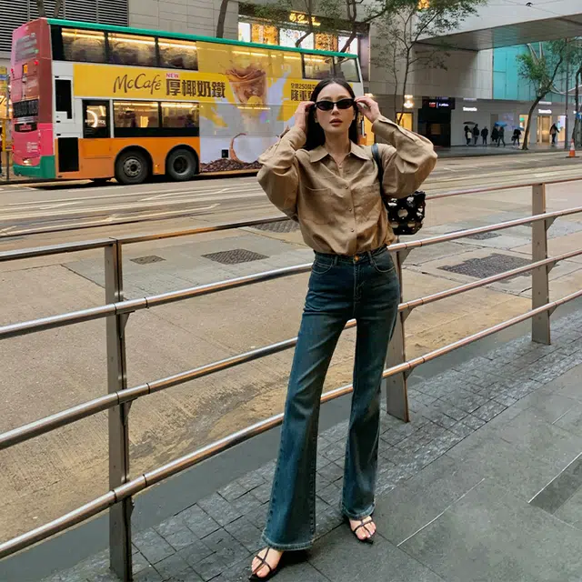 周淼 纯色纽扣长袖衬衫 女款