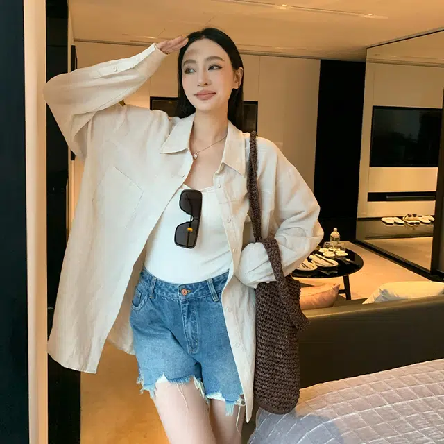 周淼 纯色纽扣长袖衬衫 女款
