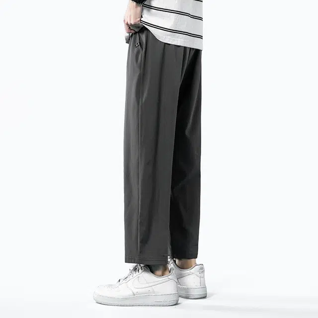 巴塞罗那足球俱乐部  纯色简约美式速干透气舒适梭织柔软透气高街嘻哈学院风基础针织百搭垂感弹力户外系带松紧直筒大码宽松中腰九分休闲裤 男女同款