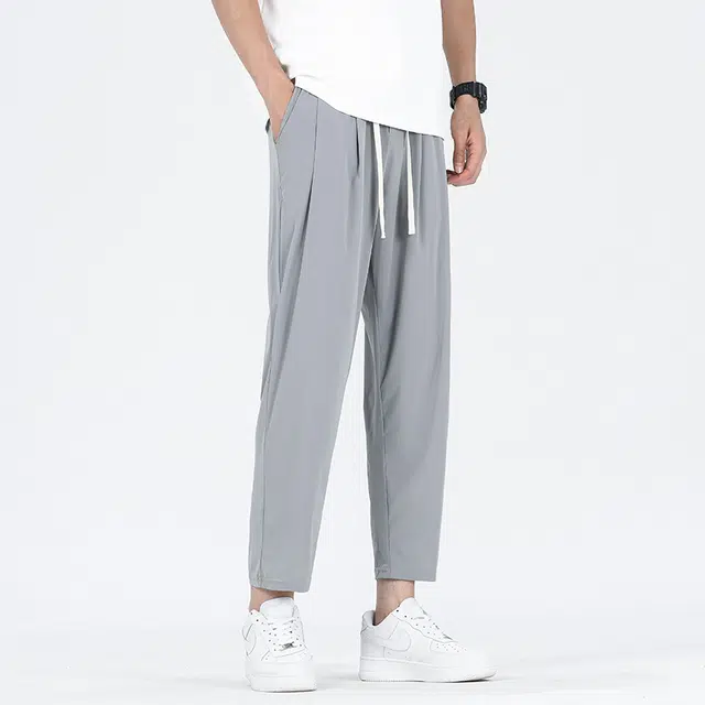 巴塞罗那足球俱乐部  纯色简约美式速干透气舒适梭织柔软透气高街嘻哈学院风基础针织百搭垂感弹力户外系带松紧直筒大码宽松中腰九分休闲裤 男女同款