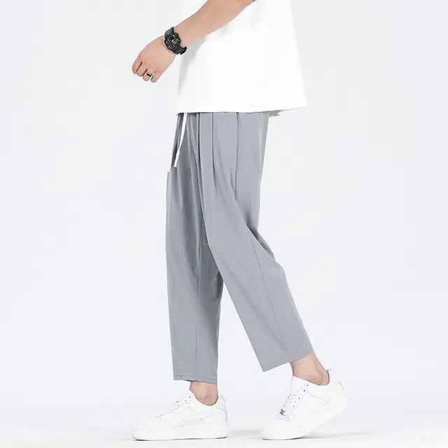 巴塞罗那足球俱乐部  纯色简约美式速干透气舒适梭织柔软透气高街嘻哈学院风基础针织百搭垂感弹力户外系带松紧直筒大码宽松中腰九分休闲裤 男女同款