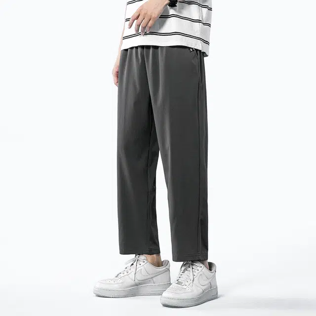 巴塞罗那足球俱乐部  纯色简约美式速干透气舒适梭织柔软透气高街嘻哈学院风基础针织百搭垂感弹力户外系带松紧直筒大码宽松中腰九分休闲裤 男女同款