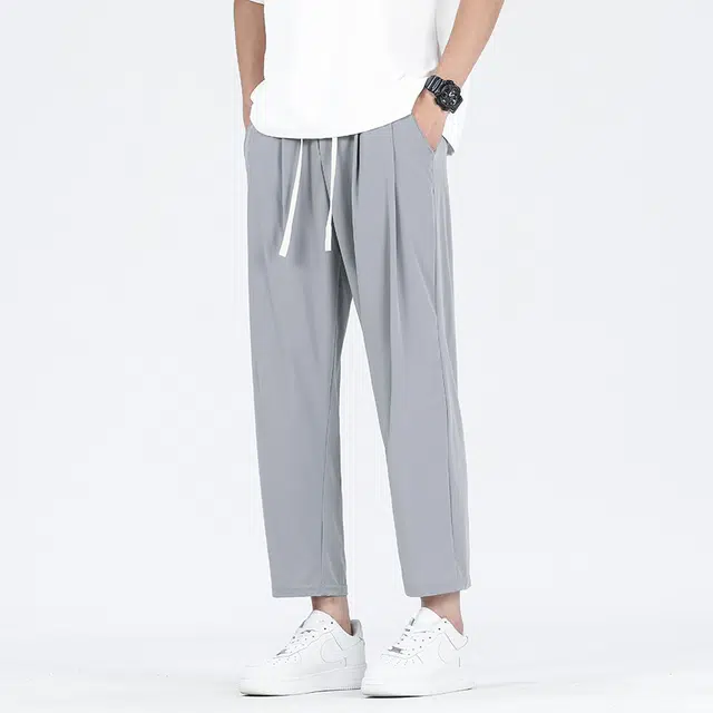 巴塞罗那足球俱乐部  纯色简约美式速干透气舒适梭织柔软透气高街嘻哈学院风基础针织百搭垂感弹力户外系带松紧直筒大码宽松中腰九分休闲裤 男女同款