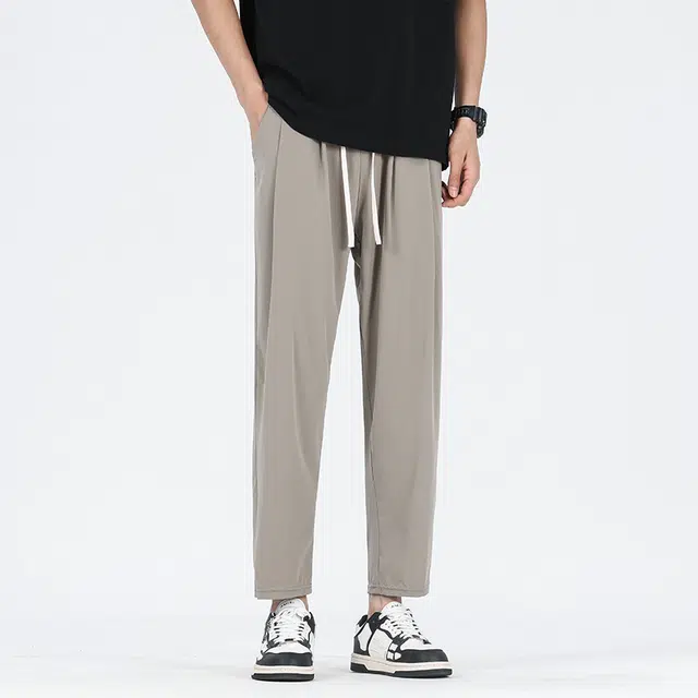 巴塞罗那足球俱乐部  纯色简约美式速干透气舒适梭织柔软透气高街嘻哈学院风基础针织百搭垂感弹力户外系带松紧直筒大码宽松中腰九分休闲裤 男女同款