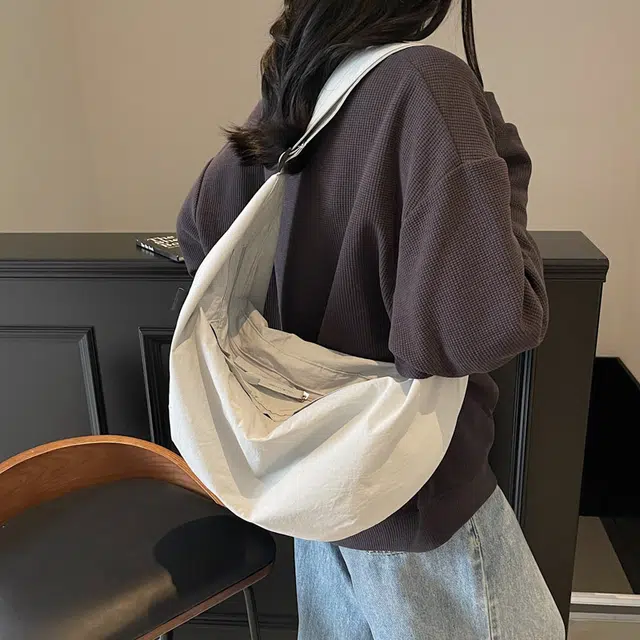 笛贝嘉 韩版简约纯色轻便多巴胺 布 饺子包单肩斜挎包 女款 多色