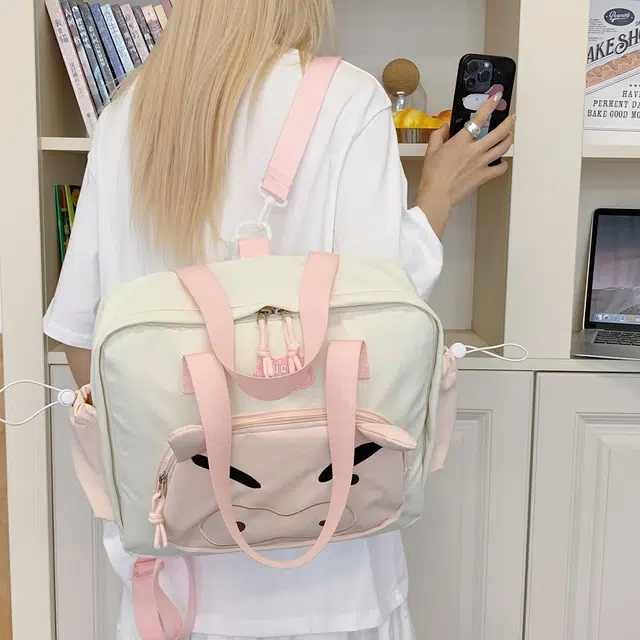 笛贝嘉 高颜值可爱卡通小猪拼色多用背包轻便百搭学生书包时尚 尼龙布 双肩包 常规 女款 粉色/蓝色