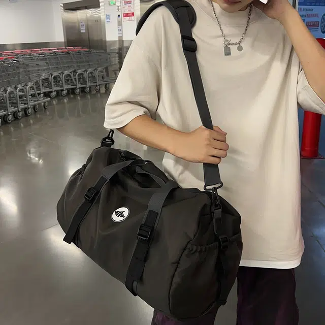 笛贝嘉 大容量潮牌休闲运动旅行背包港风轻便防水手提包 尼龙布 斜挎包 常规 男女同款情侣款 多色