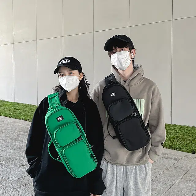 笛贝嘉 日韩中性风休闲简约时尚潮流百搭 牛津布 单肩斜挎胸包 常规 男女同款情侣款 黑色/绿色