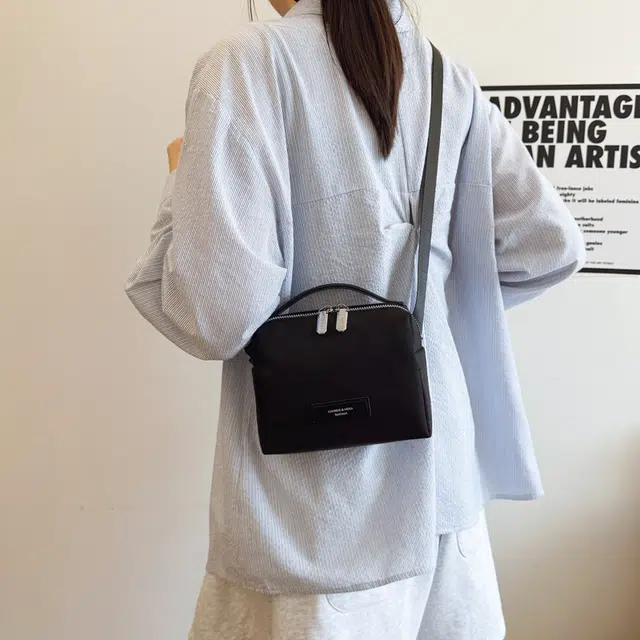 笛贝嘉 韩版超火简约纯色 布 单肩手提包 常规 女款 黑色
