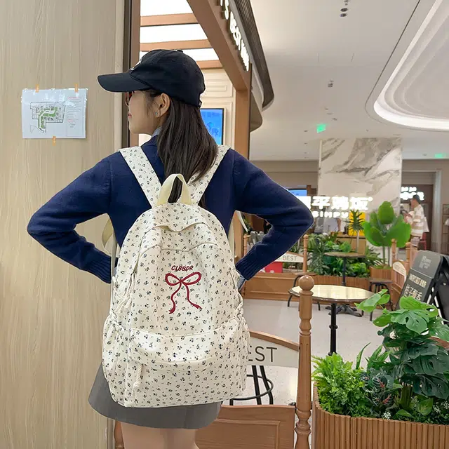 笛贝嘉 日系森系甜美蝴蝶结小花 尼龙 双肩包 女款 多色