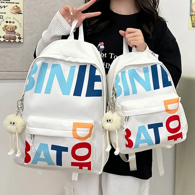 笛贝嘉 韩版小众字母印花个性学生百搭休闲背包 尼龙布 双肩包 大号 男女同款情侣款 多色