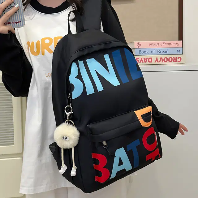笛贝嘉 韩版小众字母印花个性学生百搭休闲背包 尼龙布 双肩包 大号 男女同款情侣款 多色