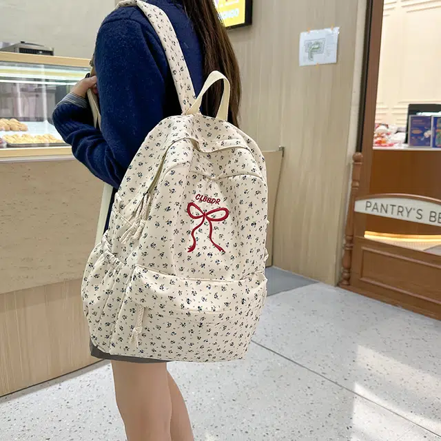 笛贝嘉 日系森系甜美蝴蝶结小花 尼龙 双肩包 女款 多色