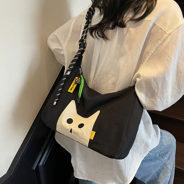 笛贝嘉 可爱猫咪小众设计轻便通勤 布 斜挎包 常规 女款 多色