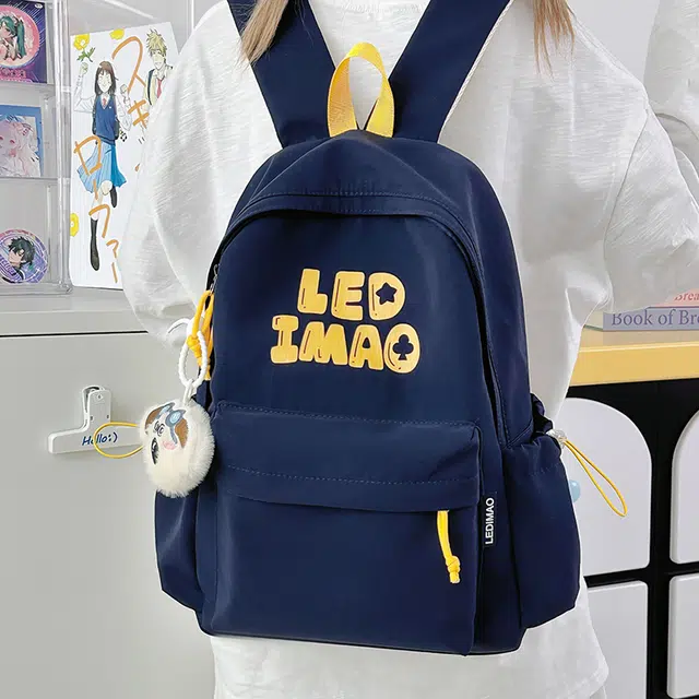 笛贝嘉 韩版初中生大容量字母背包高中生大学生休闲轻便时尚书包 涤纶 双肩包 男女同款情侣款 多色