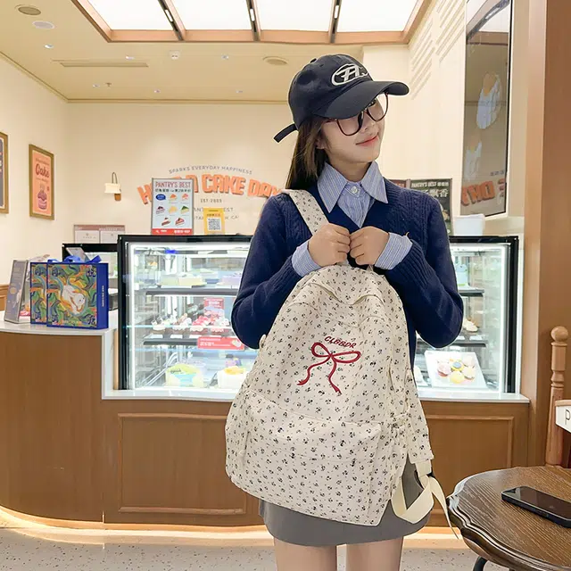 笛贝嘉 日系森系甜美蝴蝶结小花 尼龙 双肩包 女款 多色