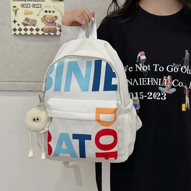 笛贝嘉 韩版小众字母印花个性学生百搭休闲背包 尼龙布 双肩包 大号 男女同款情侣款 多色