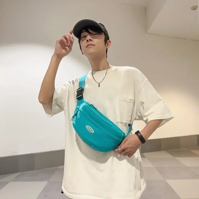 笛贝嘉简约时尚百搭纯色 单肩斜挎包胸包  女款