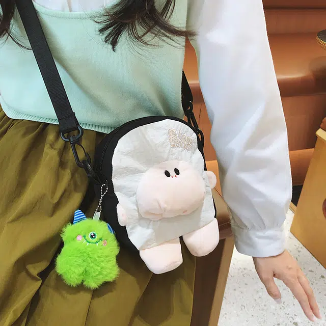 笛贝嘉 小众设计可爱卡通玩偶拼色时尚洋气 尼龙 单肩斜挎包 女款 多色