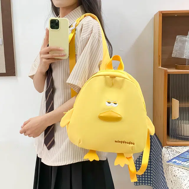 笛贝嘉 稀奇古怪可爱搞怪小鸭子轻便学生书包出行 尼龙 双肩包 常规 儿童款 多色