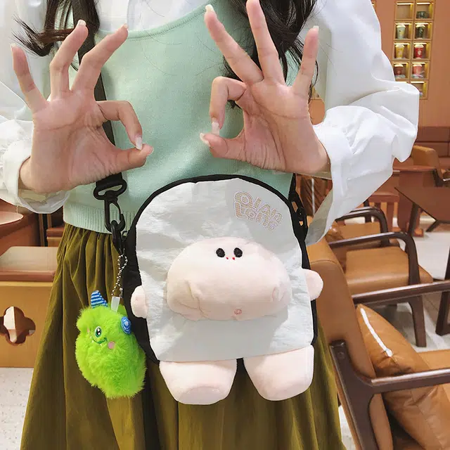 笛贝嘉 小众设计可爱卡通玩偶拼色时尚洋气 尼龙 单肩斜挎包 女款 多色