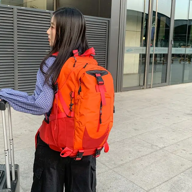 笛贝嘉 时尚简约轻便外出旅行 牛津布 双肩包 男女同款情侣款 桔红拼色