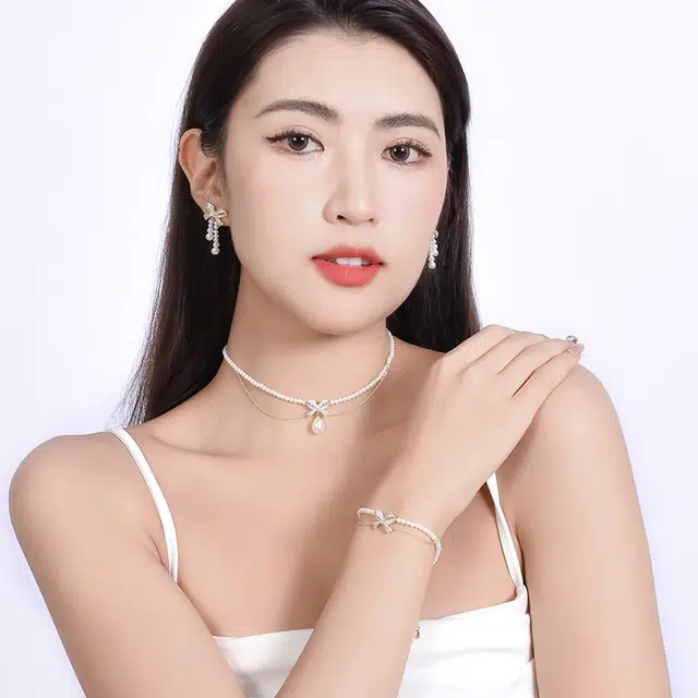 一撇一捺 淑女系列蝴蝶结 双层叠戴甜美少女感浪漫 仿珍珠镶钻 手链 女款